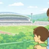 サッカースタジアムを眺める親子