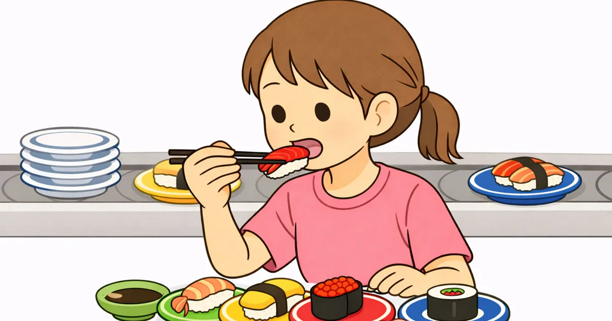 回転寿司を食べる女の子