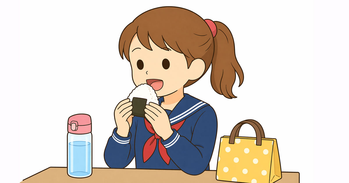 おにぎりを食べる女の子